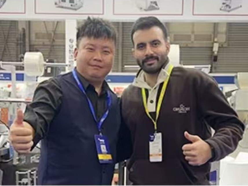 Buyer thumbs-up after a live machine demo